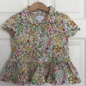 Girls floral ruffle bottom blouse